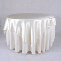 Ivory - 90 x 90 Inch Satin Square Table Overlays FuzzyFabric - Wholesale Ribbons, Tulle Fabric, Wreath Deco Mesh Supplies